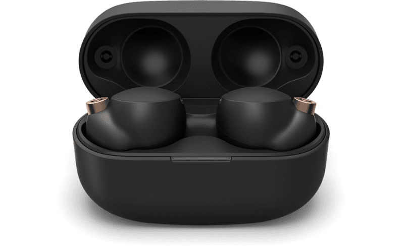 A pair of WF-1000XM4 headphones in black, sitting in their charging case with the lid raised